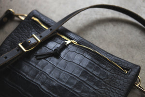 the sling, croc embossed black