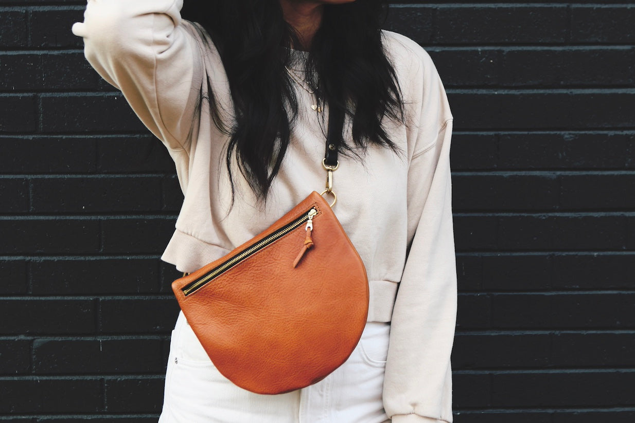 the sling, pebbled cognac (black strap, black zipper)