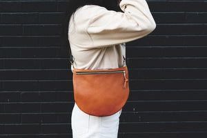 the sling, pebbled cognac (black strap, black zipper)