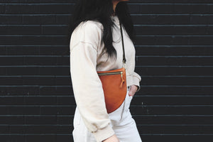 the sling, pebbled cognac (black strap, black zipper)