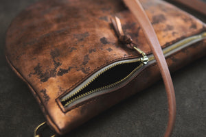 the sling, weathered copper metallic brown