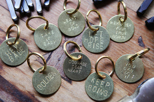 the brass key tag