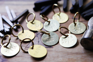 the brass key tag
