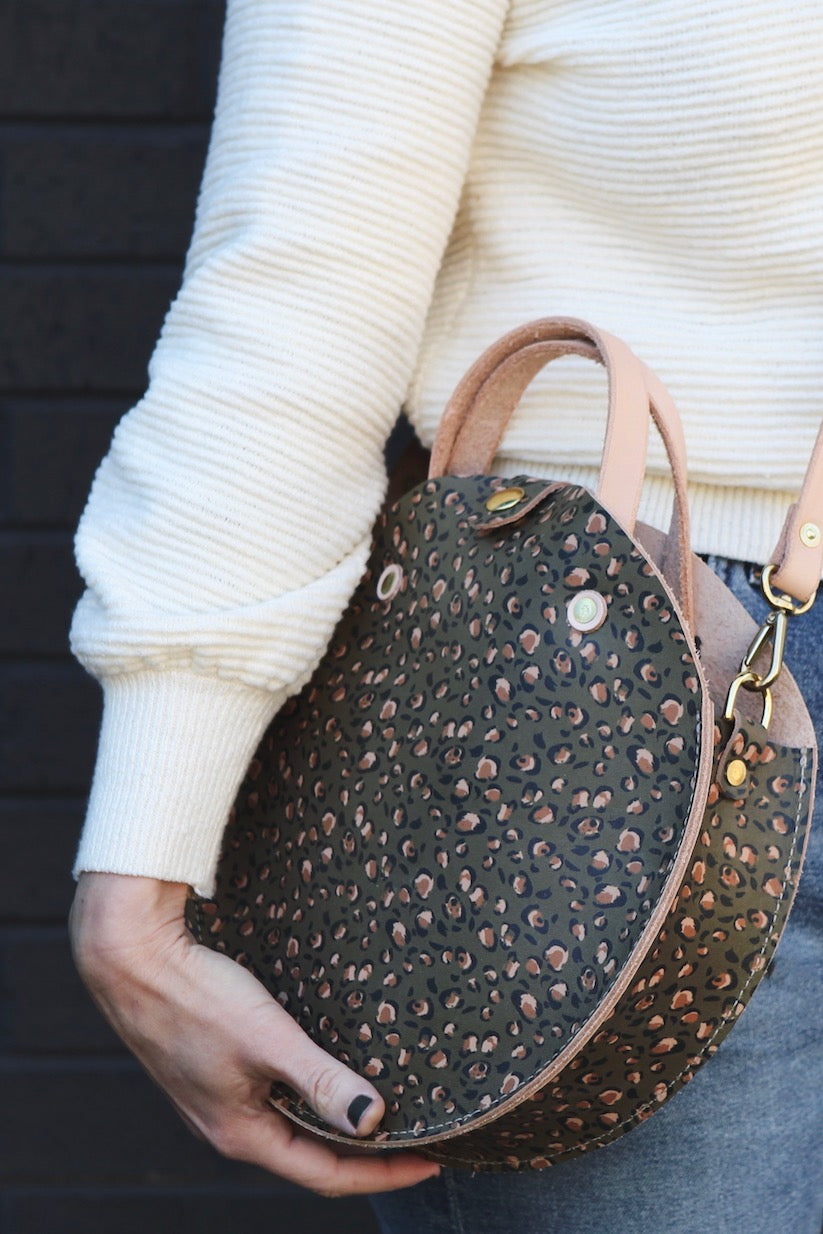 the roundabout crossbody, olive leopard print